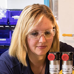 Woman working on electrical