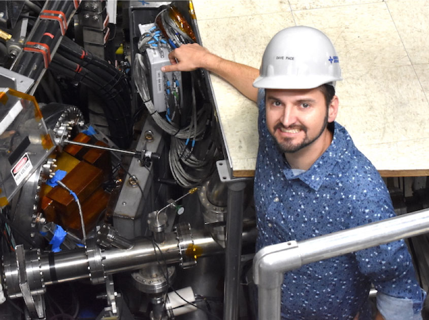 David Pace stands just above the Gamma Ray Imager