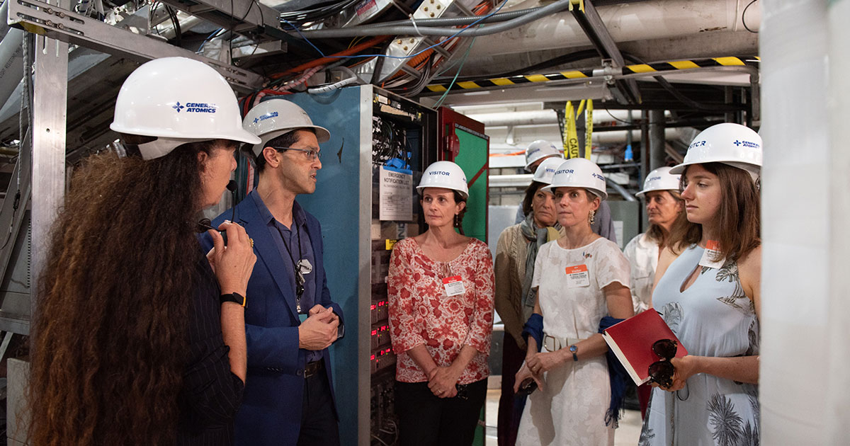 Dr. Wayne Solomon (second from left) discusses the operation of DIII-D during a tour of the facility by a delegation from the Economy commission of the French Senate, including its President, Senator Sophie Primas, as well as Consul General of France in Los Angeles Julie Duhaut-Bedos. Courtesy: General Atomics